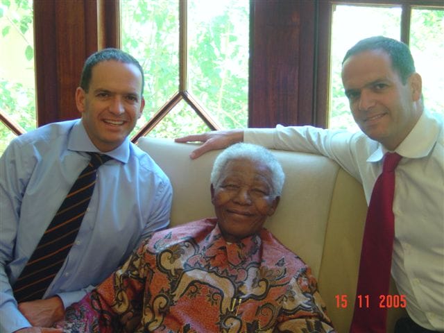 Mandela with Peter Friedland (right) and his twin brother Richard